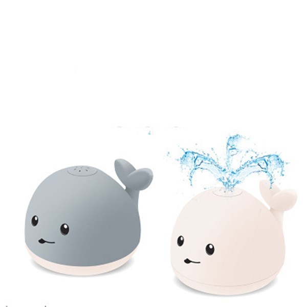 Merry & Bright Baby Cartoon Whale Floating Bath Toy – Sprays Water with Light & Music