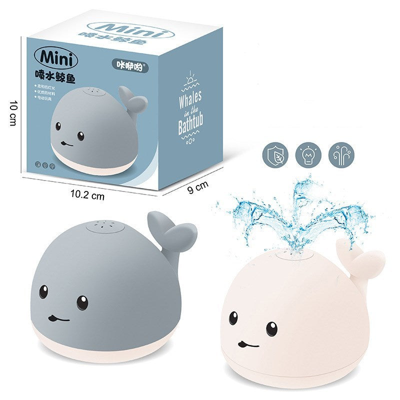 Merry & Bright Baby Cartoon Whale Floating Bath Toy – Sprays Water with Light & Music