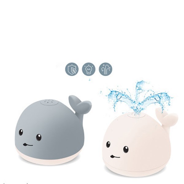Merry & Bright Baby Cartoon Whale Floating Bath Toy – Sprays Water with Light & Music